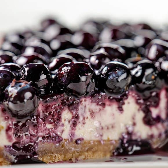 milkychoco04_food_photography_of_A_closeup_of_blueberry_cheesec_20dca2c5-dba9-4274-ab1f-9eef8102440c